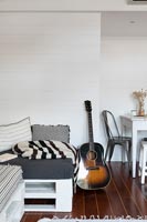 Guitar in modern open plan living room 