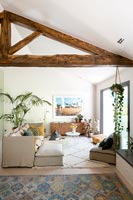 Modern living room with exposed wooden beams 