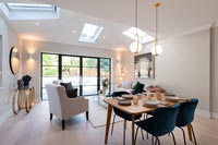 Modern open plan living space with dining area 
