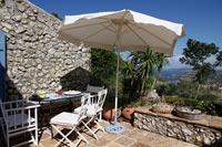 Mediterranean terrace with seating area and scenic views 