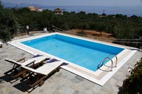 Overview of swimming pool with coastal views 