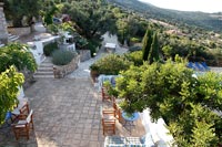 Overview of paved terrace with seating areas and scenic views 