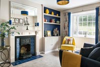 Modern blue and yellow themed living room 