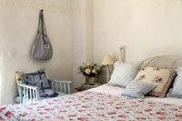 Country bedroom with floral bedding 