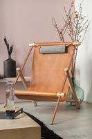 Leather deckchairs style seat in modern living room 