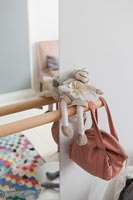 Detail of toy and bag in childrens room 