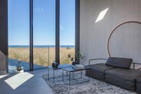 Contemporary living room with coastal views