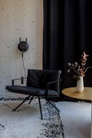 Modern black chair and gold side table 