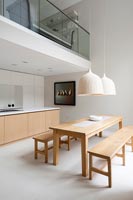 Contemporary kitchen diner with view to mezzanine 