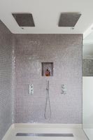 Mosaic tiling in modern wet room 
