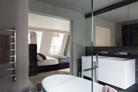 Modern en-suite bathroom with view to bedroom 