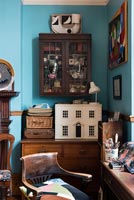 Vintage furniture in eclectic bedroom 