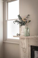 Vases on marble fireplace 