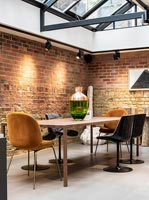 Modern dinging room with exposed brickwork