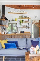 Grey sofa in open plan living space 