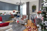 Open plan living space decorated for Christmas 