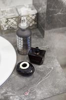 Bathroom accessories on marble sink 