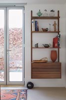 French windows and wall mounted shelf unit 