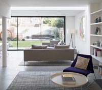 Chair and side table modern open plan living space 