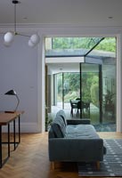 Modern sofa in open plan living space 