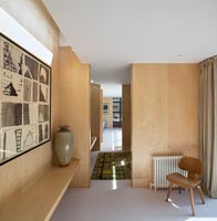 View along corridor with wooden partition walls 