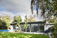 View of contemporary house across modern garden 