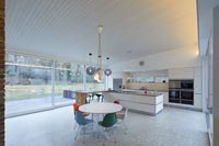 Large white contemporary kitchen-diner 