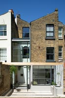 Terraced town house with contemporary glazed extension 