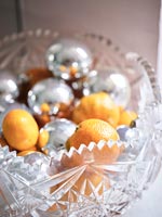 Christmas baubles and oranges 