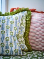 Patterned fabric covered cushions 