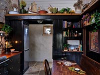 Small black painted country kitchen-diner