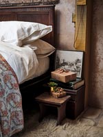Christmas gifts on country bedside table