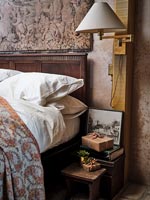 Christmas gifts on country bedside table