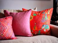 Colourful cushions on sofa