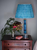 Blue lamp on sidetable