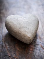 Heart shaped stone on table