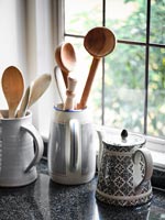 Kitchen utensils on kitchen worktop