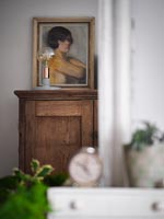 Country chest of drawers with portrait 