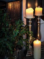 Candles in silver candelabras  