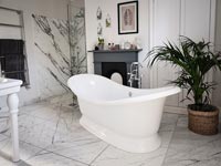 Classic style monochrome bathroom with decorative marble tiling 