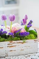 Spring flower display on table 