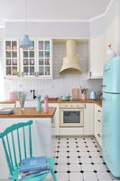 Modern kitchen with pastel accessories 