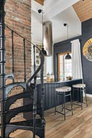 Spiral staircase and modern kitchen 