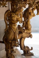 Detail of ornate gilded table legs 