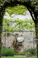 Classical statue in garden 