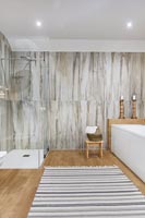 Modern bathroom with marble wall 