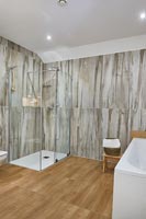 Modern bathroom with marble wall 