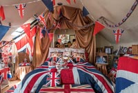 Bedroom decorated in Union Jack Flags 