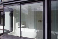 View through windows into modern bathroom 