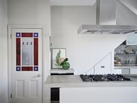 Modern kitchen with stained glass internal door 
